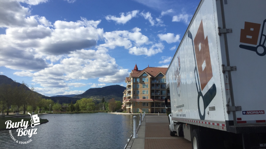 Burly Boyz truck by waterfront during a long-distance move with cross country movers Canada