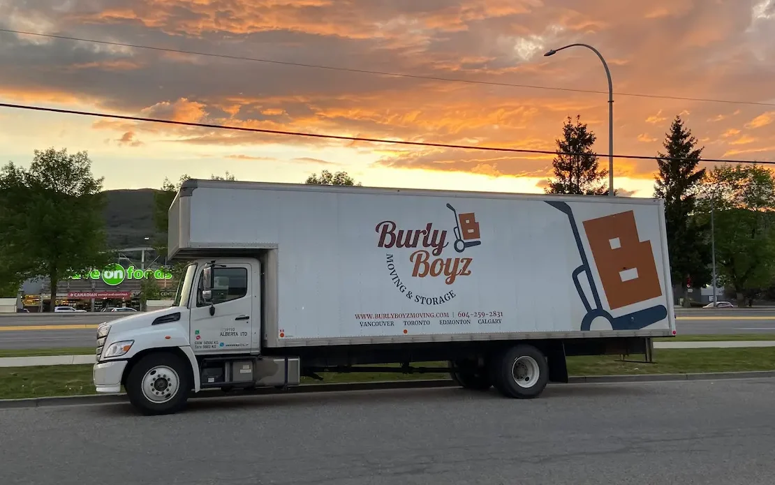 Burly Boyz Moving & Storage, the leading Moving Company in Calgary with the truck parked at sunset during a local move