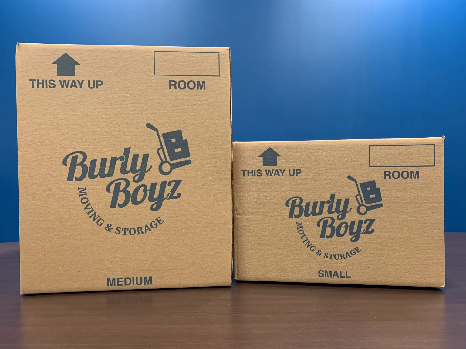 Boxes ready to pack with labels and inventory sheet—moving inventory list setup.